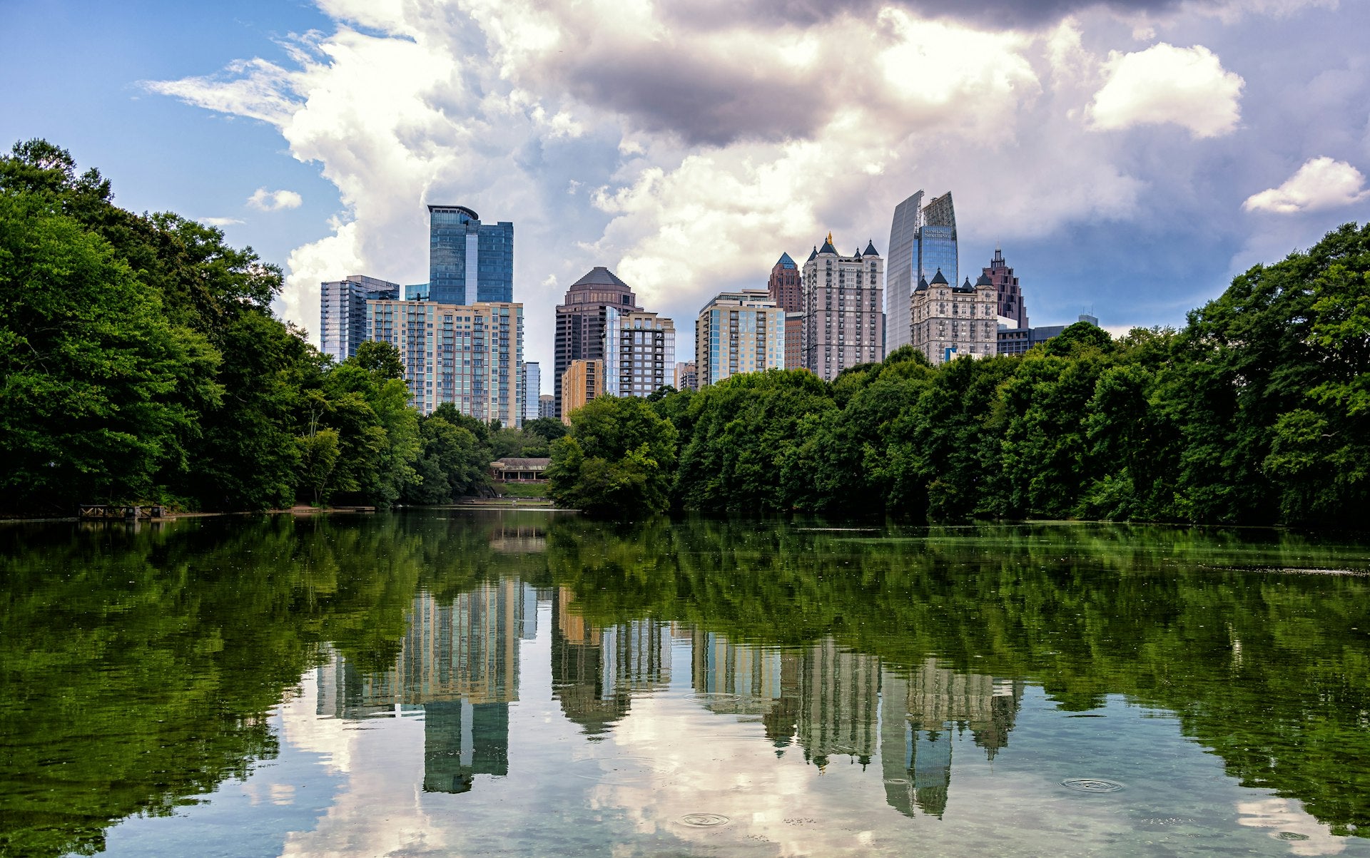 Atlanta skyline from lake with city reflection