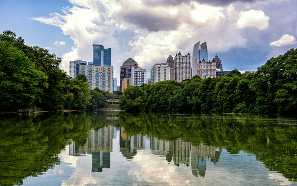 Atlanta skyline from lake with city reflection