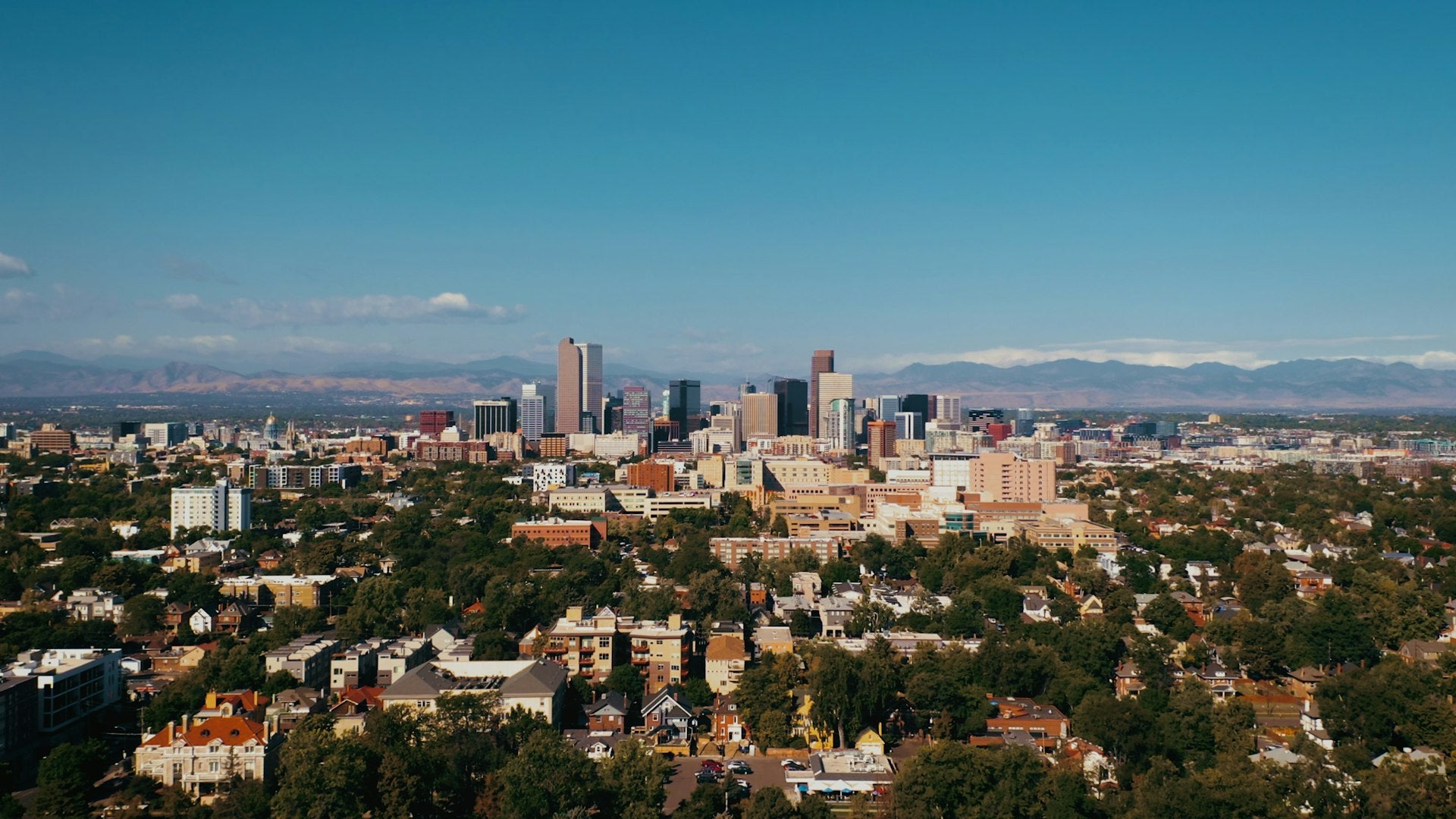 Denver skyline with Rocky Mountains in the background
