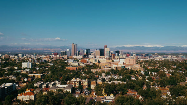Denver skyline with Rocky Mountains in the background