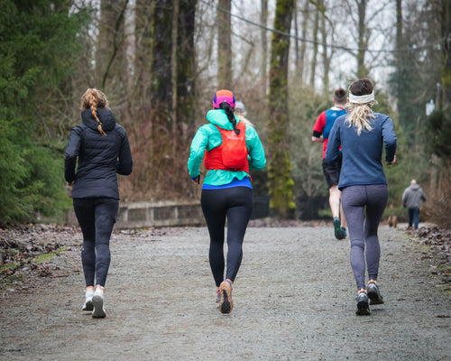 Group of women jogging together on forest trail representing active lifestyle and on-the-go freshness needs