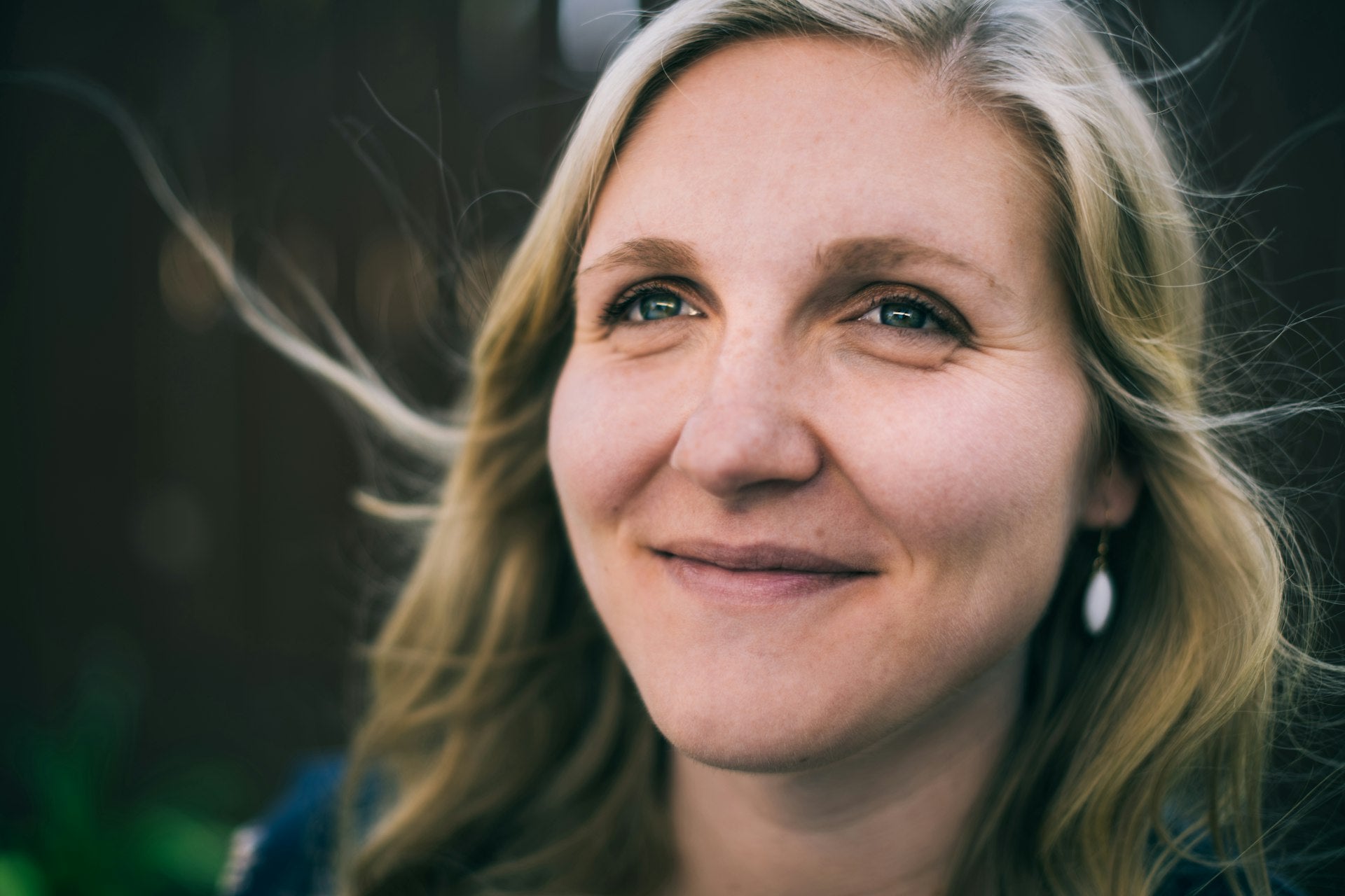 Confident woman in her fifties representing graceful menopause and intimate wellness