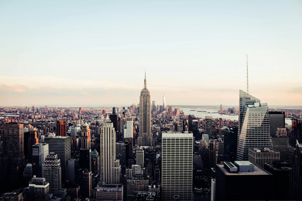 Manhattan skyline at sunset viewed from Brooklyn Bridge